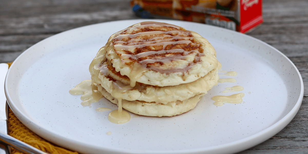 Cinnamon Roll Pancakes with Cream Cheese Drizzle